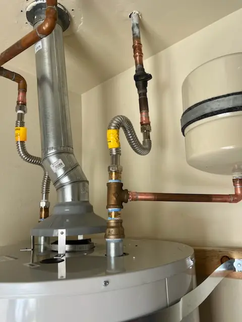 Water heater installation and plumbing repair in Plymouth Gardens